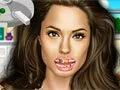 Анджелина Джоли у дантиста